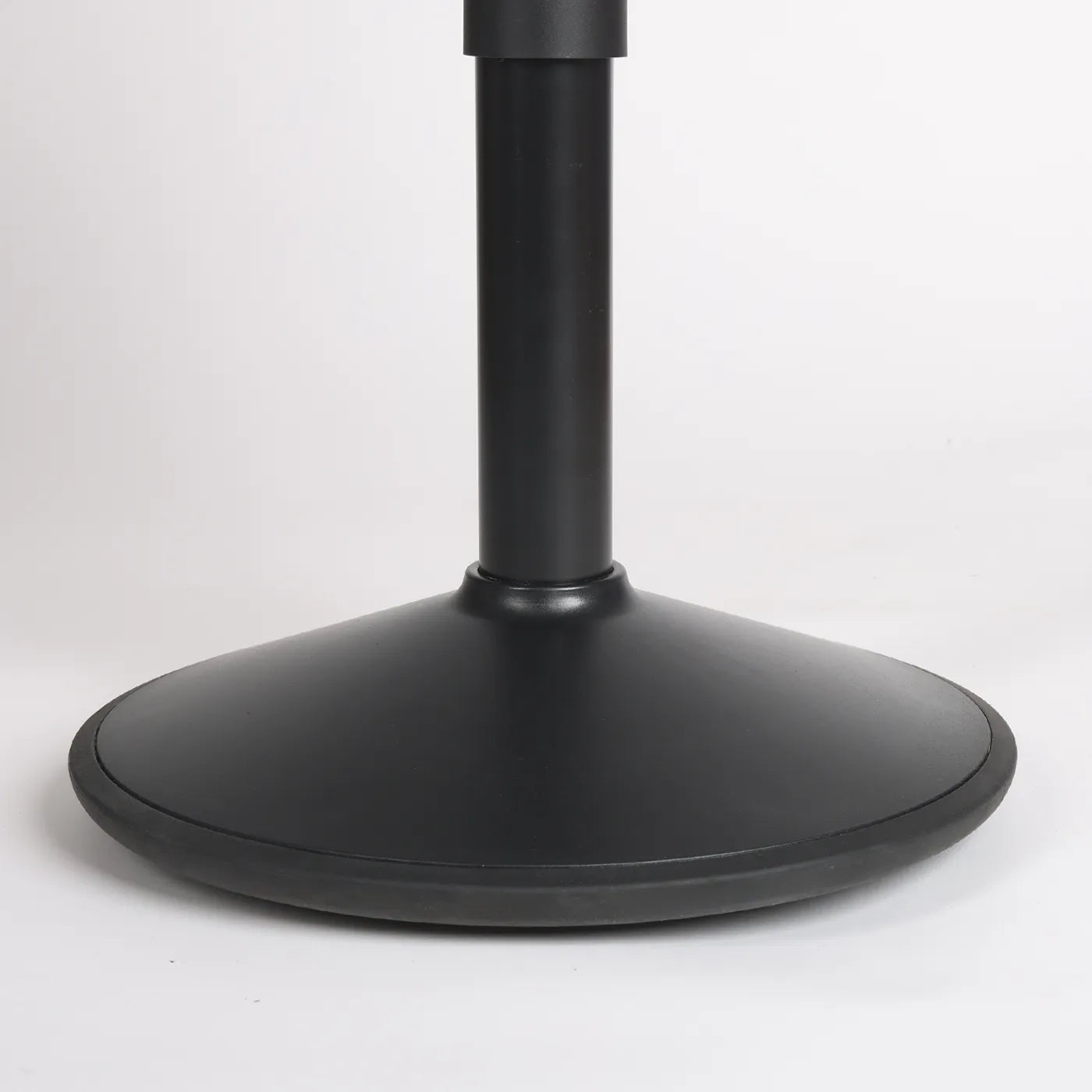Close-up studio photo of a Wobblez Savvy or Soothe light wobble stool base with the bottom rubber edge visible.