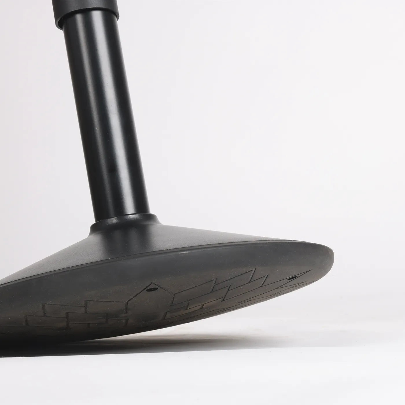 Close-up studio photo of a Wobblez Savvy or Soothe light wobble stool base tilted with the bottom rubber visible.