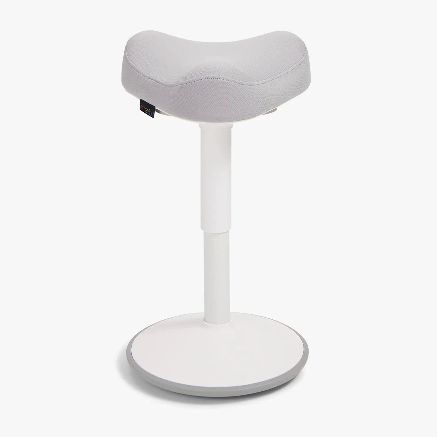 A Wobblez white saddle wobble stool designed for ergonomic support, featuring a curved seat and a stable base named Soothe