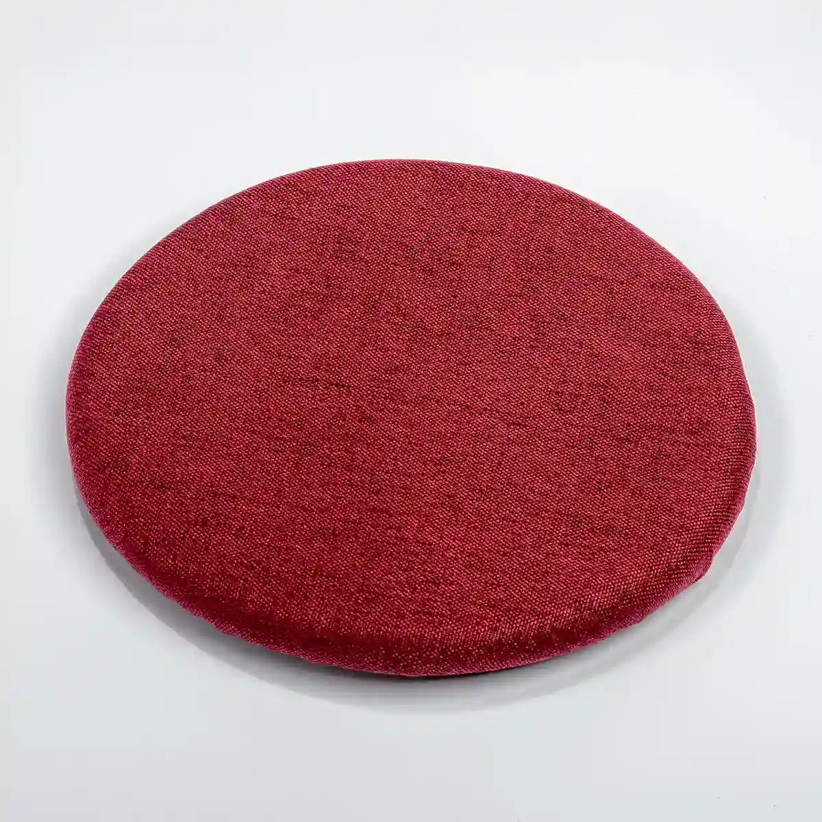 Studiophotography top view of a Wobblez Bordeaux Red Skins cover for the Savvy & Spine wobble stools on a white background