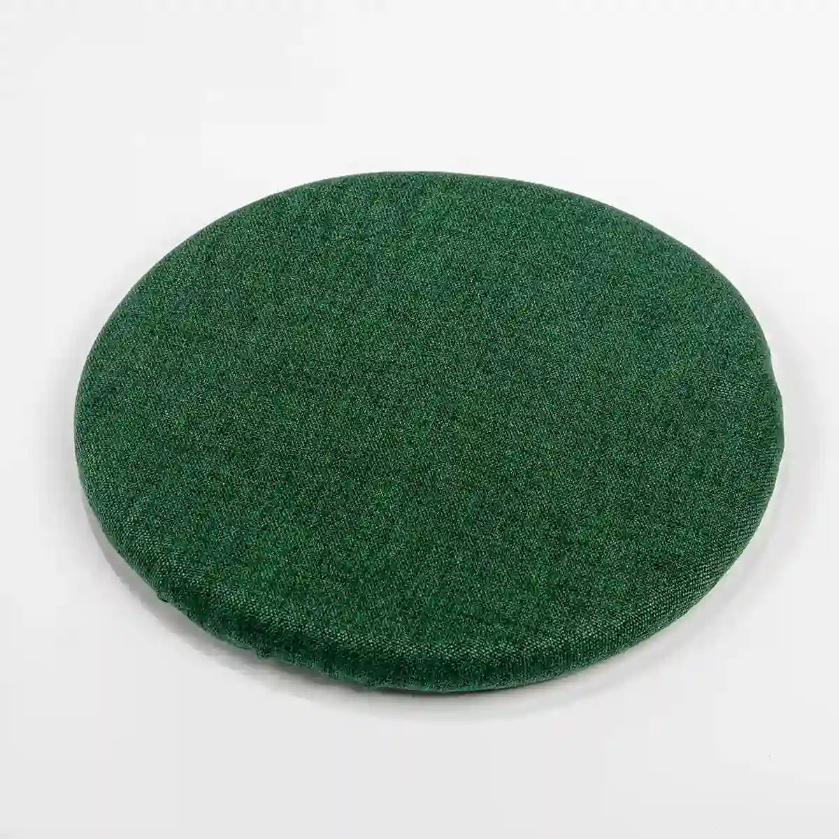Studiophotography top view of a Wobblez Forest Green Skins cover for the Savvy & Spine wobble stools on a white background