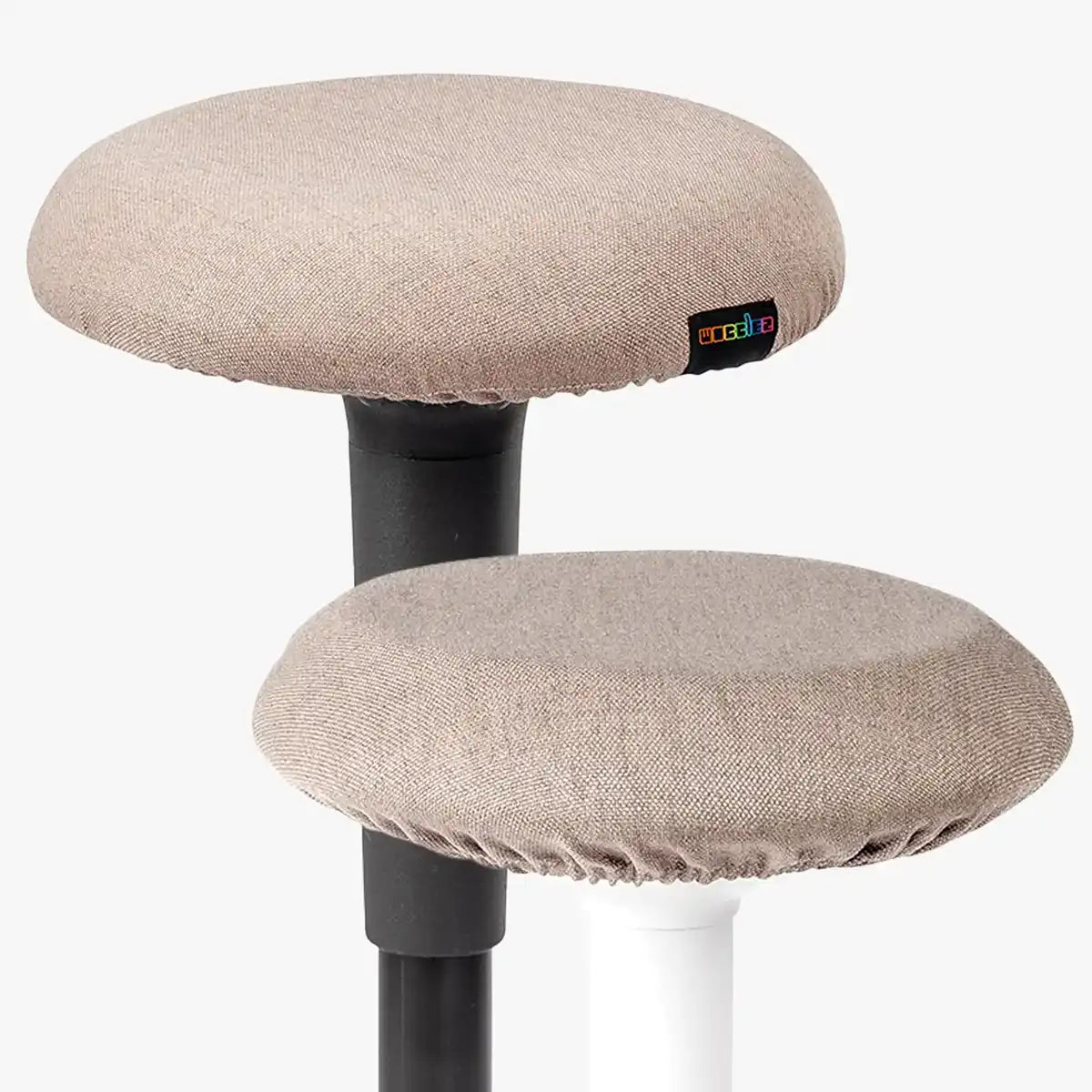 Studio photography of Taupe Wobblez Skins, premium seat stool covers slip over a Spine and Savvy wobble stools