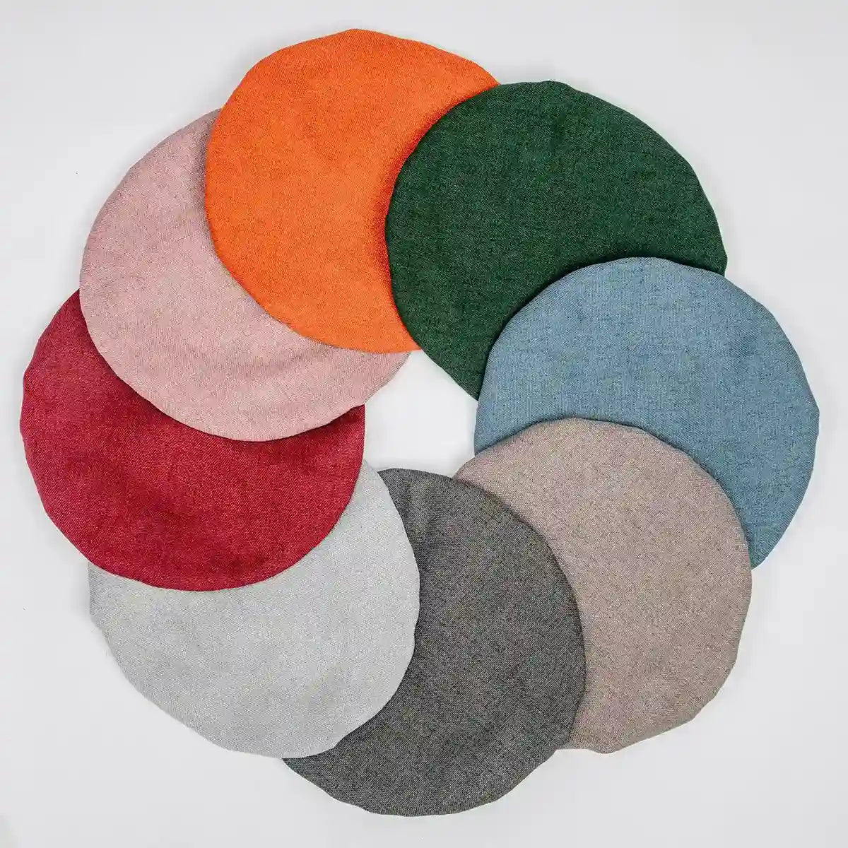 Set of colorful round Wobblez Skins covers on a white background
