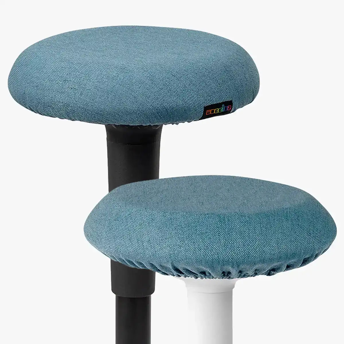 Studio photography of Blue Wobblez Skins, premium seat stool covers slip over a Spine and Savvy wobble stools