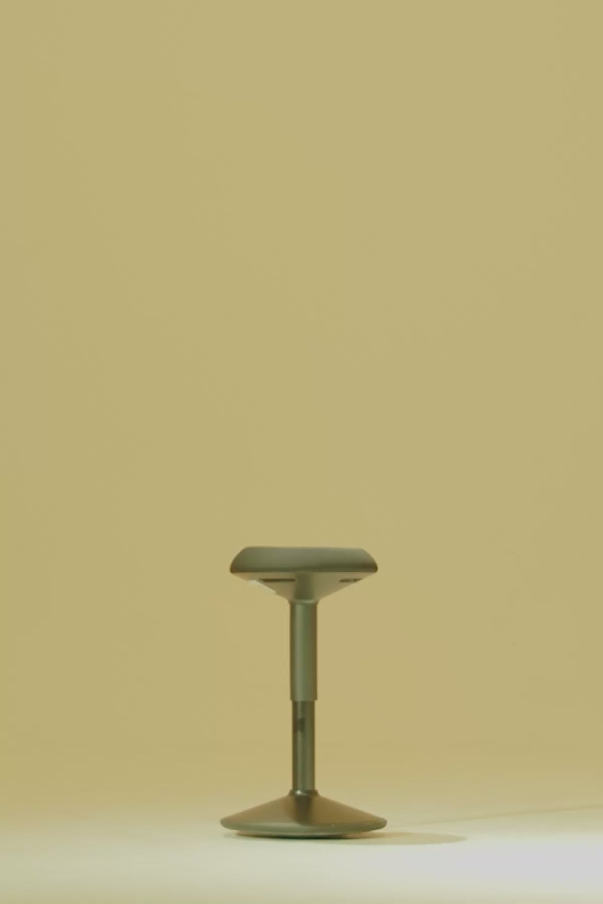 A short mobile video of person kicking the Wobblez Savvy wobble stool so it wobbles while he walks away