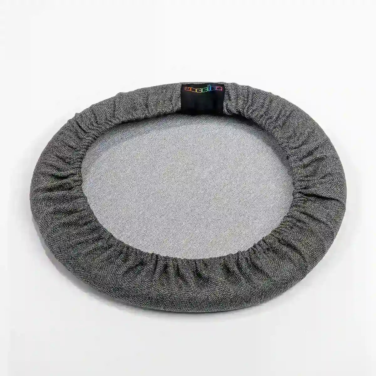 Bottom view studio photography of Anthracite Wobblez Skins, a premium seat stool cover for Spine and Savvy wobble stools