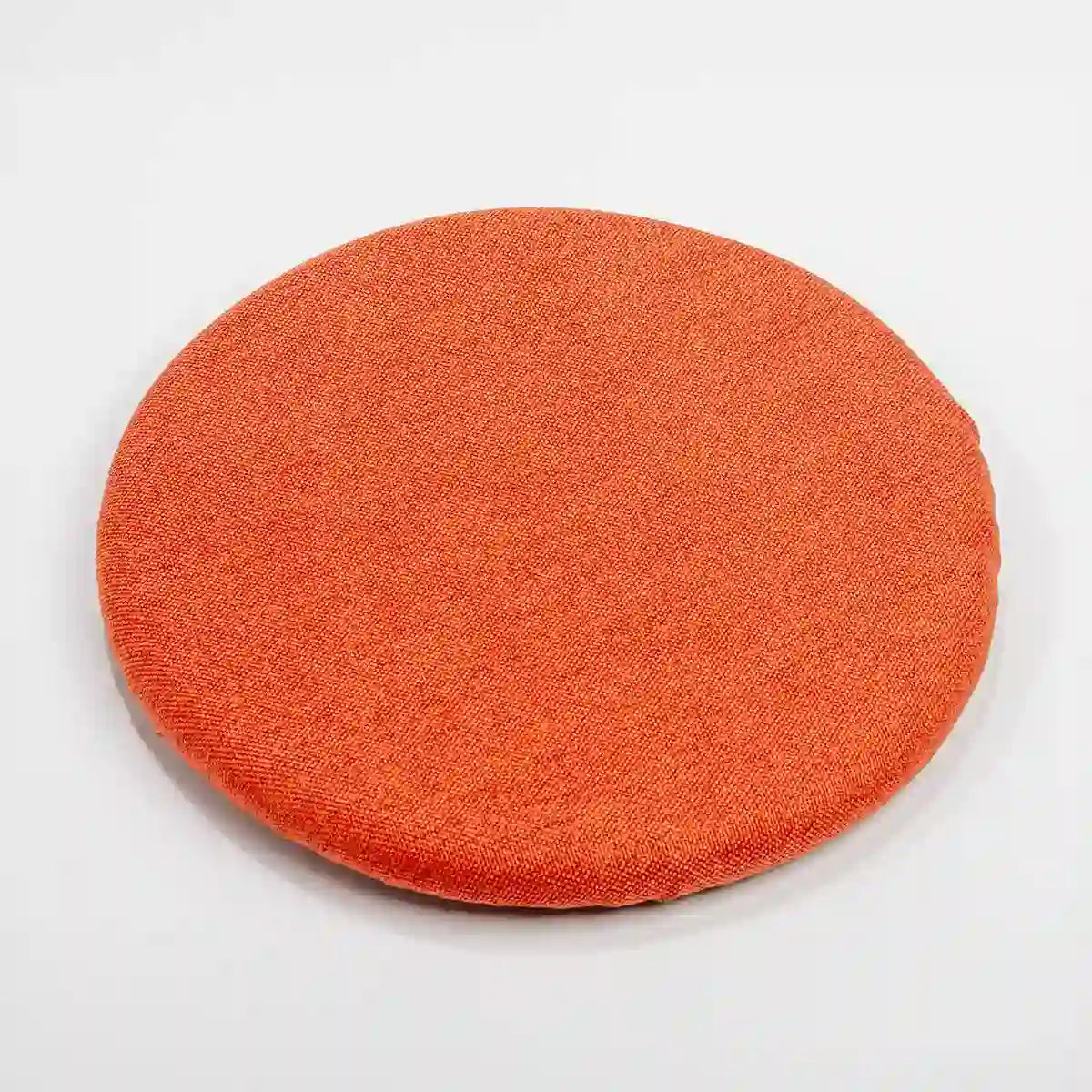 Studiophotography top view of a Wobblez Coral Orange Skins cover for the Savvy & Spine wobble stools on a white background
