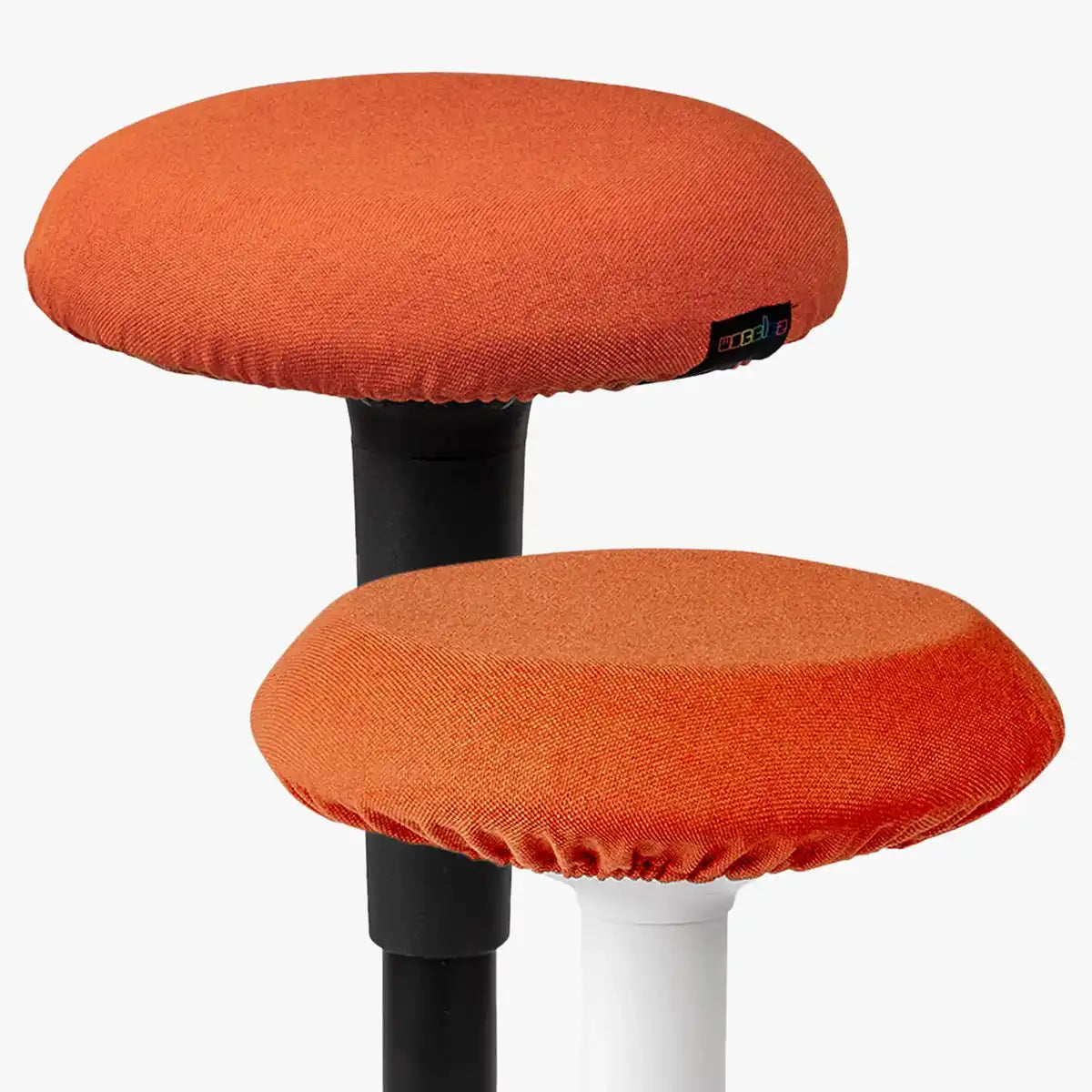 Studio photography of Coral Wobblez Skins, premium seat stool covers slip over a Spine and Savvy wobble stools
