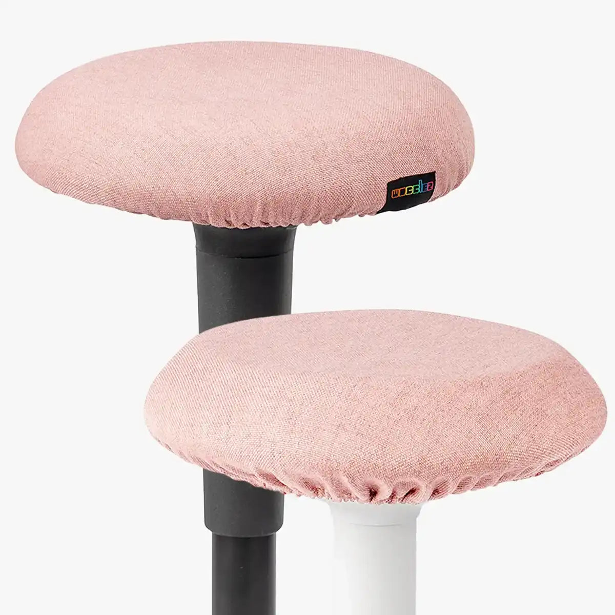 Studio photography of Pink Wobblez Skins, premium seat stool covers slip over a Spine and Savvy wobble stools